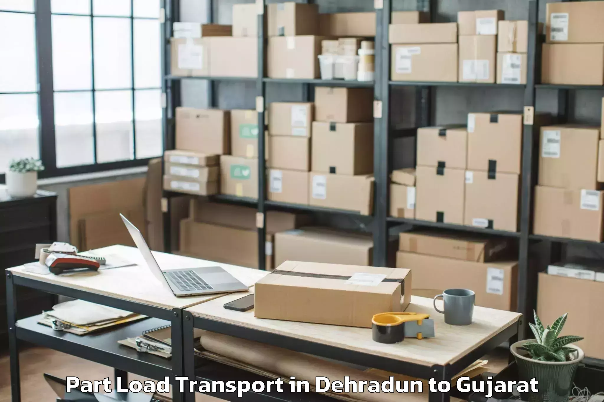 Book Your Dehradun to Keshod Airport Ixk Part Load Transport Today